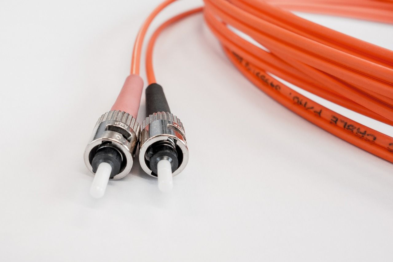 Fiber optic cables and connectors for telecommunications